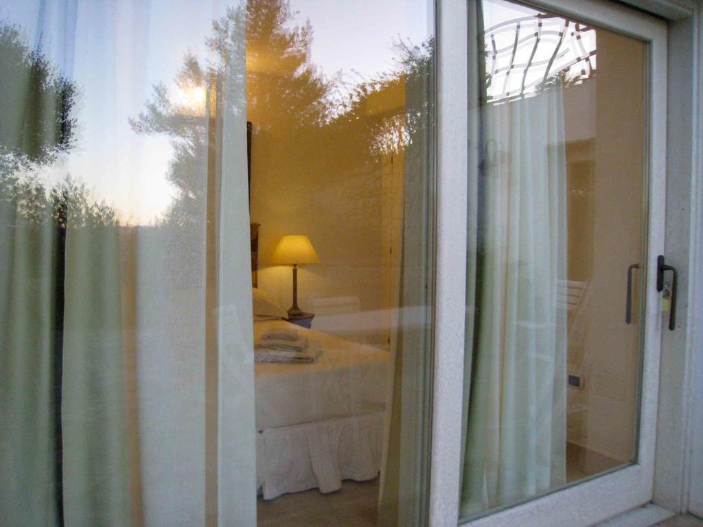 Le Tre Pietre Villa บายาซาร์ดิเนีย ภายนอก รูปภาพ